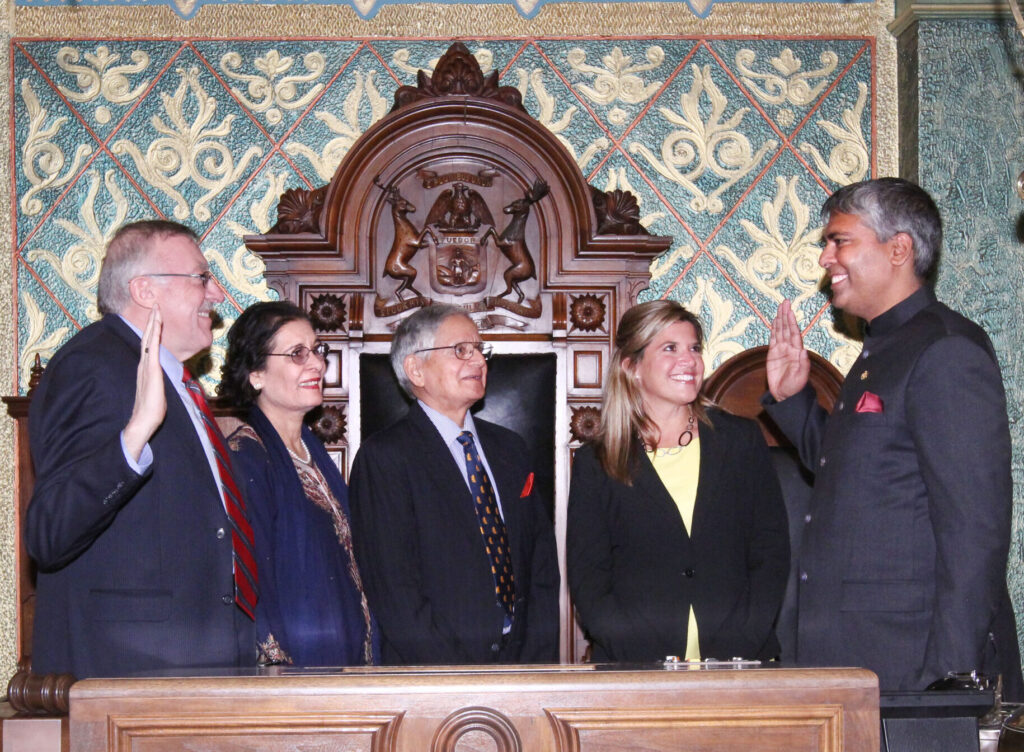 Sam being sworn into the MI House of Representatives